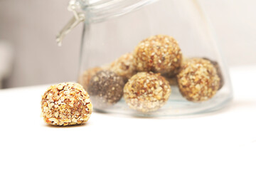 Energy balls on a white wooden background