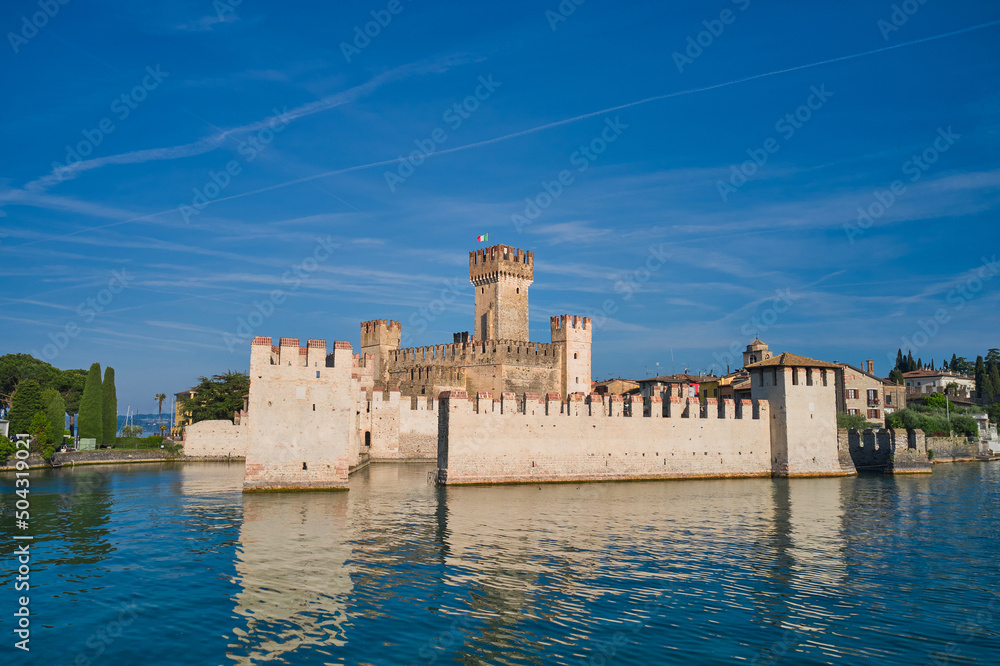 Canvas Prints Scaligero Castle drone view.  Aerial view to the town of Sirmione, Italy. Popular travel destination on Lake Garda in Italy.