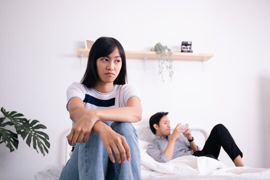 Couples are having problems in their marriage.Not talk to each other from adultery problems.Asian-Thai couple, beautiful and handsome,are unhappy in sex.
flirtatious man Secretly chatting in  Phone.