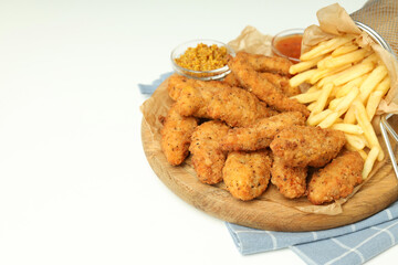 Concept of tasty food with chicken strips, space for text