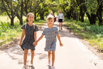 Basic school students crossing the road