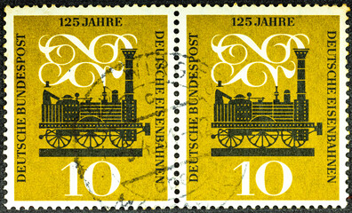 GERMANY - CIRCA 1960: A postage stamp printed in Germany showing Adler the first steam locomotive...
