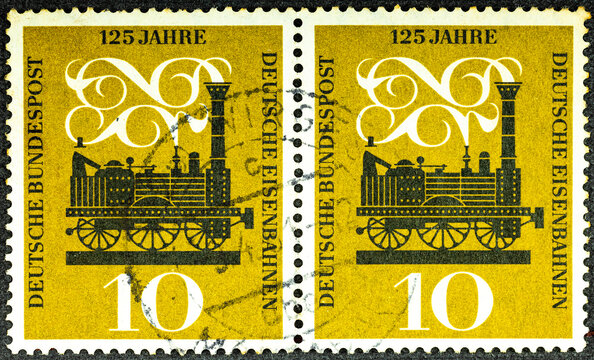 GERMANY - CIRCA 1960: A postage stamp printed in Germany showing Adler the first steam locomotive between N rnberg and F rth. 125 years of German railways. CIRCA 1960.