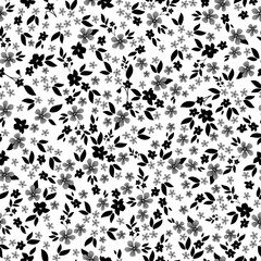 Simple vintage pattern. Small black and gray flowers, leaves. White background. Fashionable print for textiles, wallpaper and packaging.