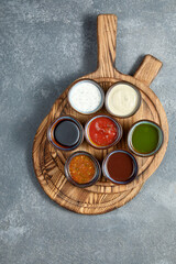 Obraz na płótnie Canvas Overhead view of assortment of different sauces