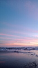 Sea waves water at sunset