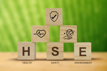 HSE on word letters cube, Health Safety Environment acronym, illustration.