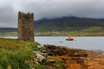View of the Carrick Kildavnet Castle on Achill island in Ireland