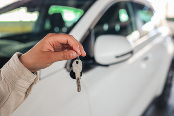 Keys in hand, car in the parking lot