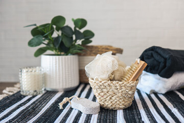 Fototapeta na wymiar Spa wellness setting concept. Spa accessories on a white background. Towel, massage brush, pumice stone, washcloth, candle