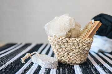 Spa wellness setting concept. Spa accessories on a white background. Towel, massage brush, pumice. Flat Lay, top view. Copy space