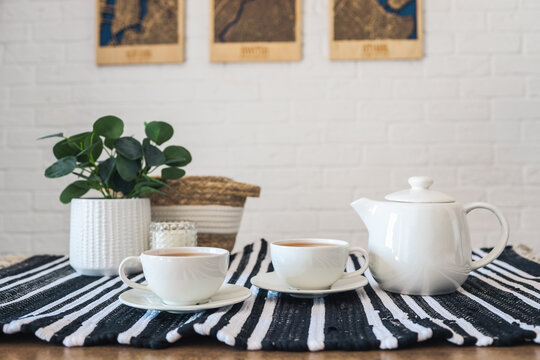 Two cups of tea, tea drinking in Scandinavian cuisine. Beautiful cozy home interior photography