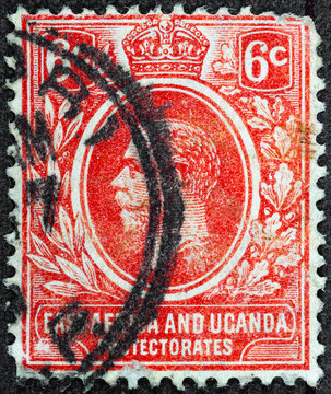A stamp printed on British territory. Shows a portrait of King George V, circa 1927.