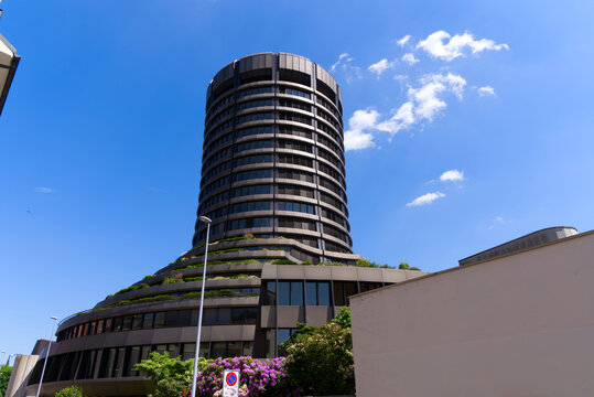 Round office tower of Bank for International Settlements BIS at City of Basel on a sunny spring day. Photo taken May 11th, 2022, Basel, Switzerland.