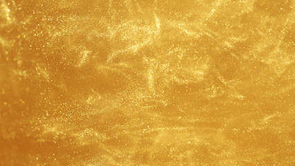 Fototapeta na wymiar Golden glitters in water, abstract background.