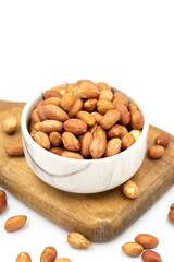 Peanuts on a white background. Healthy and fresh.nuts. Close-up.