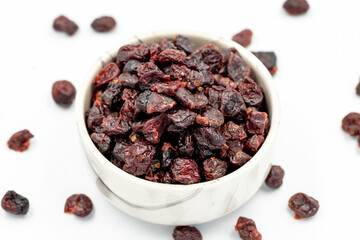 Dried blueberry on a white background. Healthy and fresh.nuts. Close-up.