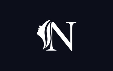 Purple beauty spa and hair logo and symbol design vector with the letter and alphabet N