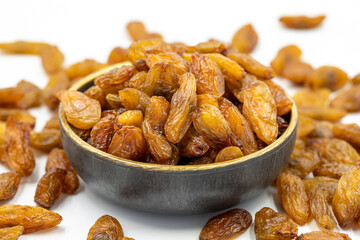 Dried raisins on a white background. Raw grapes and raisins. Healthy and fresh nuts. close-up. Local name besni uzum