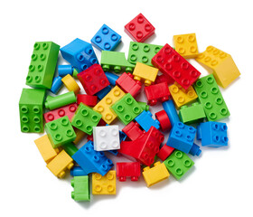 Obraz premium Scattered parts of a plastic children's designer, top view