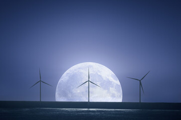 renewable energy with wind turbines at night - Powered by Adobe