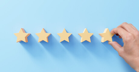 5 stars rating review, best quality products and services concept with customer giving feedback....