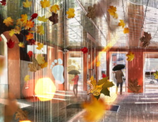 people silhouette with umbrella on  rainy street orange modern buildings windows glass reflection , architecture  at rainy cirty urban background  weather