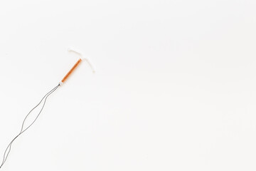 Intrauterine contraceptive device closeup. Birth control contraception concept