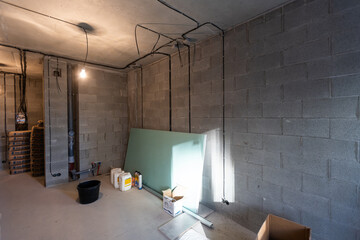 Working process of installing metal frames for plasterboard -drywall - for making gypsum walls in...