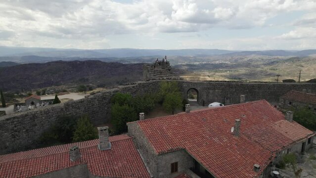 Defensive ramparts surrounding historical village, Sortelha; aerial arc