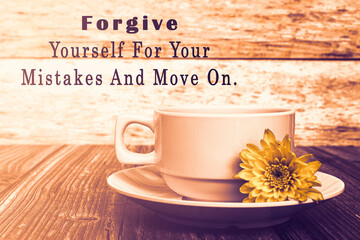 Motivational quote with coffee cup and flowers on wooden table. - obrazy, fototapety, plakaty