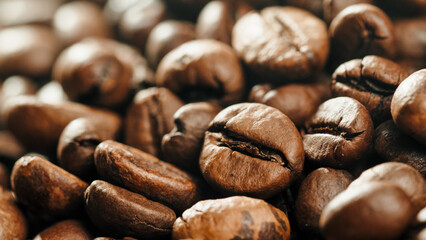 Roasted coffe beans with smoke coming out during cooking.