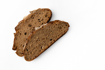 slices of rye bread on white background, top view