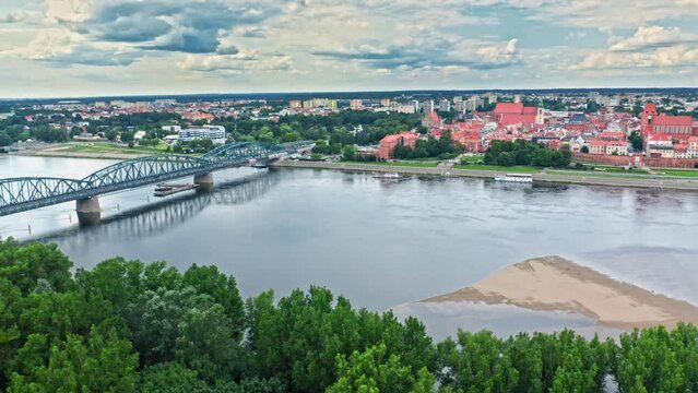 Summer view of Torun old town and Vistula river.