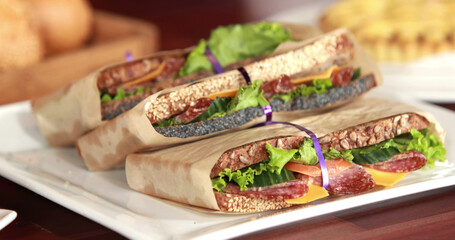 Image of planet earth and hands over fresh organic sandwiches and bread rolls