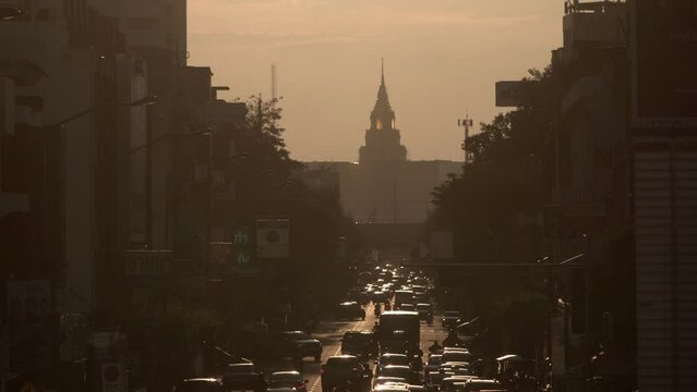 Evening traffic near Thai parliament building "Sappaya-Sapasathan"in Bangkok.