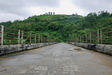 Fototapeta premium An empty bridge at Kiwirar River in Mbeya, Tanzania