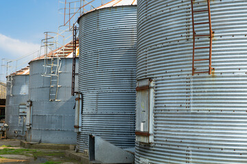 Close up of old grain silos on a farm © NosamA