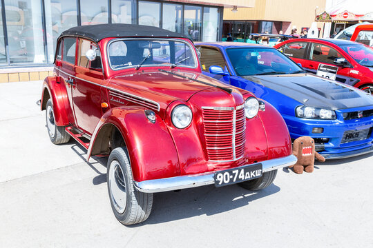 Vintage soviet Moskvich-401 vehicle at the city street
