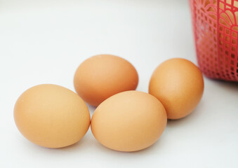 Eggs in a basket - Eggs isolated on a white background