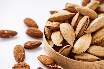 fresh almonds in shell on a white background