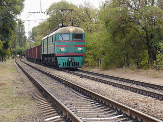 Fototapeta na wymiar Freight train approaches to the station. Mariupol.