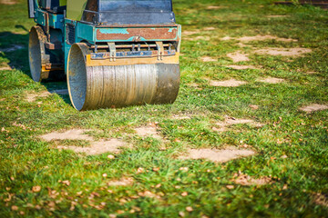 Obraz premium Picture of a road roller machine on the different surfaces