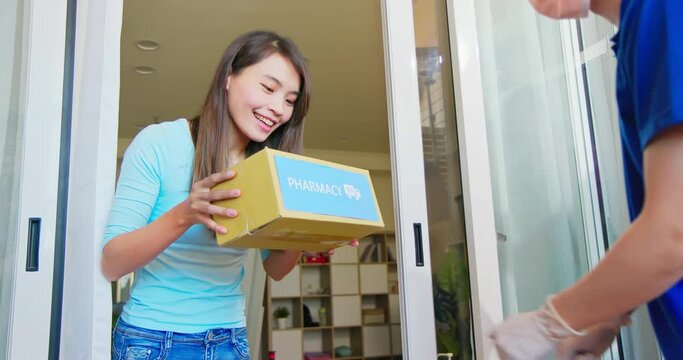 woman receive medicine delivery