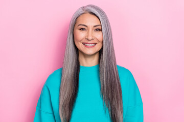 Photo of satisfied glad person toothy smile look camera isolated on pastel pink color background