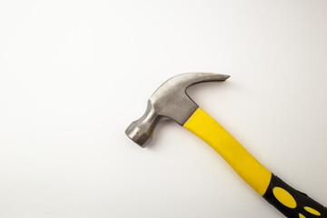 Construction hammer on white background