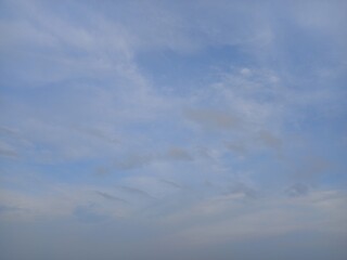 ight blue sky with cirrus cloud