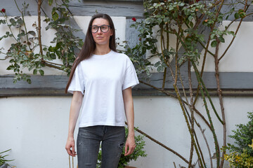 Woman wearing white t-shirt in the city