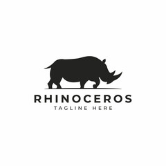 African Rhinoceros Standing Silhouette Logo Premium Vector. Rhino Side View