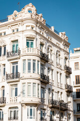Fototapeta na wymiar white building with stucco decor in valencia, spain.